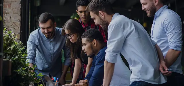Team reviewing product work together